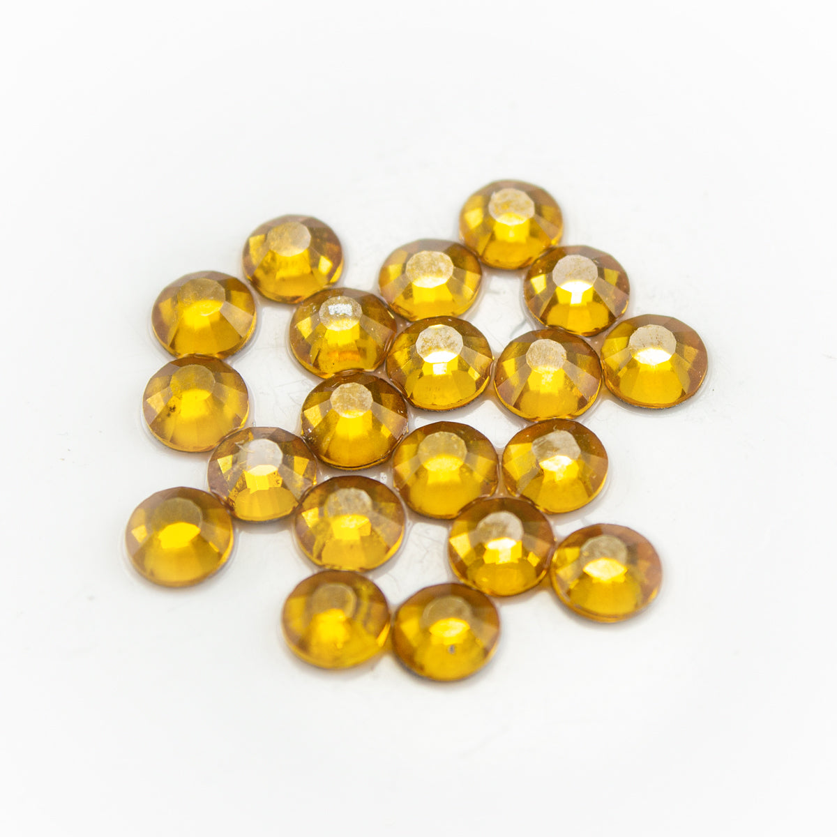 Swarovski дек. кам. 3.91 мм златни /Topaz/- 20 бр L